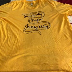 Bright yellow t shirt with saying by Mary Poppins